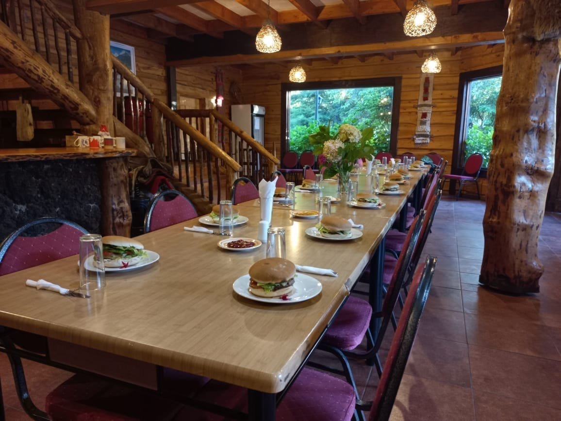 The venue dining room with a long table set for a group