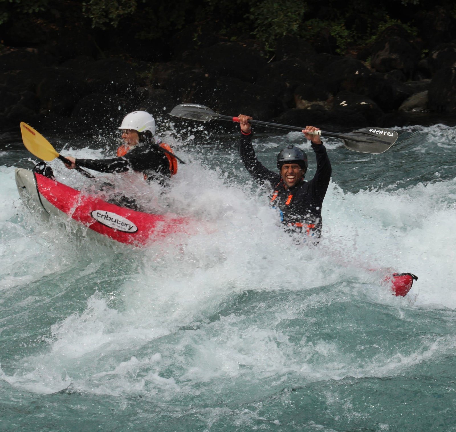 A red ducky enters a white water rapid