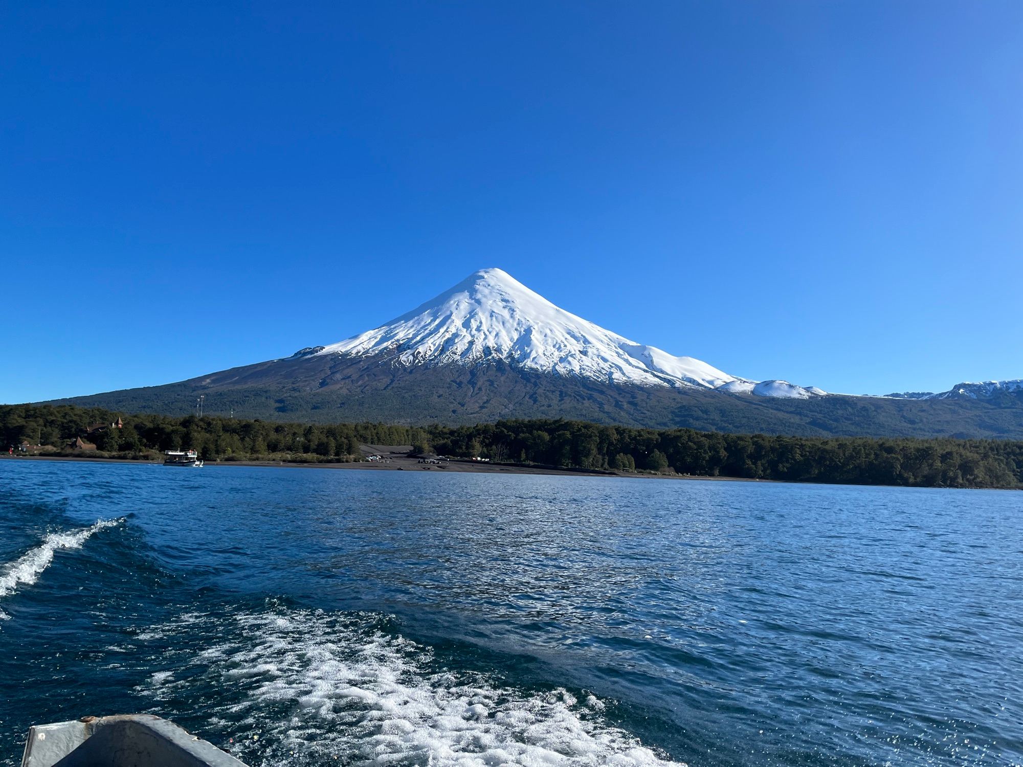 Snow-capped Osorno Volcano seen from a boat on Lake Todos los Santos