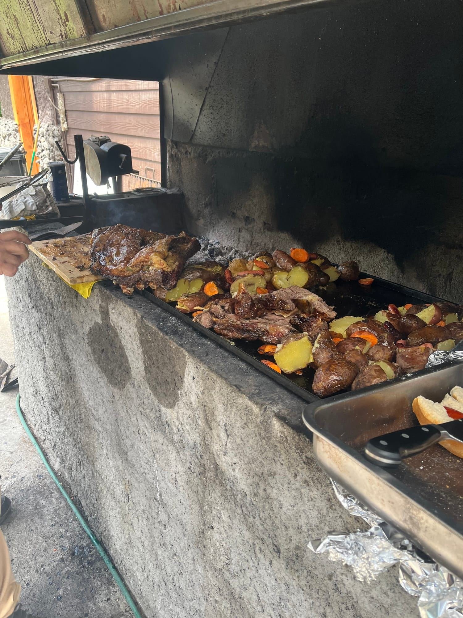 The quincho grill with roasted meats and vegetables